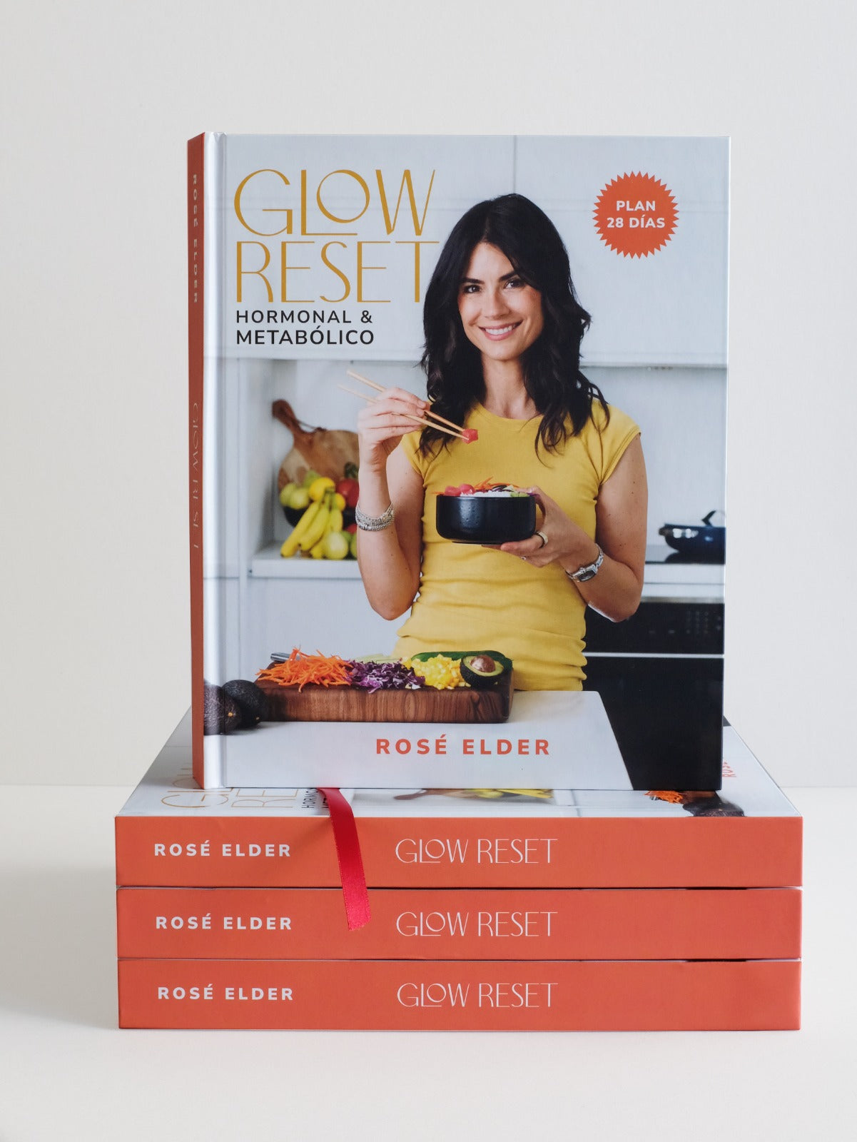 Book titled 'Glow Reset' by Rosé Elder with a woman in a kitchen on the cover.